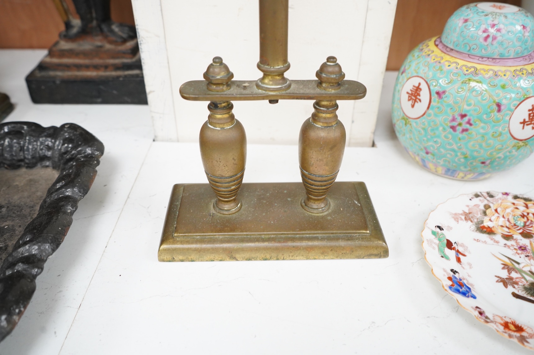 A collection of various metal wares to include door stops, boot scraper, spelter figure etc, largest 49cm high